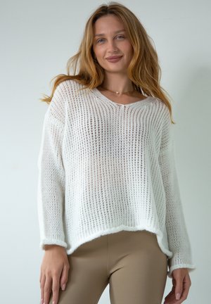 - Sweter