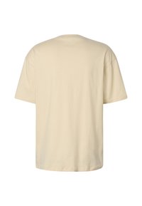 T-shirt beige uni à manches courtes, présenté de dos avec un col rond et une coupe décontractée sur fond blanc.