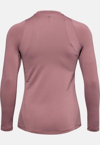 Koszulka sportowa z długim rękawem w stonowanym odcieniu mauve, z oddychającymi panelami siateczkowymi po bokach, gładkim materiałem i dopasowanym fasonem.