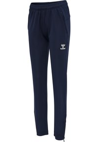 Marineblauwe sportbroek met elastische tailleband, ritsen bij de enkels, zijzakken en wit hummel-logo op linker bovenbeen.