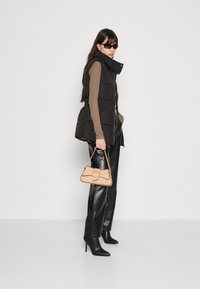 JDY Vest - black/cloud dancer