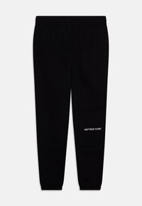 Zwarte joggingbroek van zachte stof, met een elastische tailleband, een taps toelopend ontwerp en een witte "A&F NEW YORK" logo op de onderkant van het linkerbeen.
