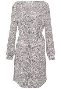 Černobílé šaty s puntíky, dlouhými rukávy, kulatým výstřihem, elastickým pasem a detailem na zavazování. Měkká látka s volným střihem.