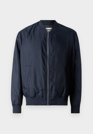 Marine bomberjakke med en glat, skinnende overflade, ribbede manchetter og kant, har lynlås foran og sidelommer.