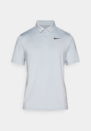 Light grey Nike polo shirt with a collar, short sleeves, and a black swoosh logo on the upper left chest. Smooth, breathable fabric.