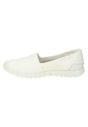 Women’s white slip-on shoe with textured cushioned sole and smooth upper, designed for comfort and casual wear.