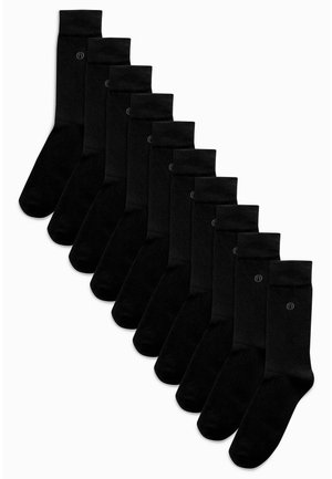 Schwarze Baumwollsocken, zehn Paare ausgestellt, knielang mit gerippten Bündchen, glatte Textur, einfaches Design und minimale Markenkennzeichnung.