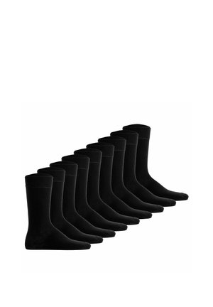 Zehn Paar schwarze kniehohe Socken ordentlich nebeneinander auf weißem Hintergrund ausgelegt.