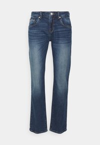 Uppvikta blårandiga denimjeans med medelhög midja, två framfickor och subtila blekningar. Klassisk 5-fickorsdesign med sömdekor.