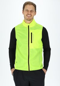 Swedemount PACKABLE WIND - Bodywarmer - neon