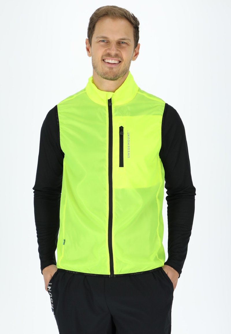 Swedemount PACKABLE WIND - Bodywarmer - neon
