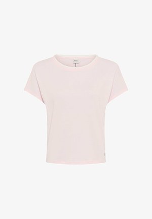 T-shirt rosa chiaro a maniche corte con scollo tondo, con una piccola etichetta del marchio sul collo e un logo discreto sull'orlo inferiore.