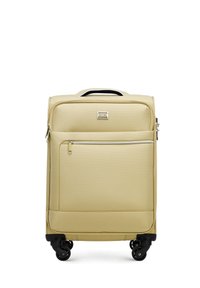 Lichtbeige rolkoffer met een gestructureerde oppervlakte, twee ritscompartimenten, een bovenhandgreep en vier zwarte wielen voor wendbaarheid.