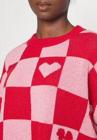 ONLY Petite Stickad tröja - pink