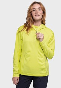 Helle gelbe Kapuzenpullover mit einem Halbreißverschluss-Design, langen Ärmeln und strukturiertem Stoff. Verfügt über Seitentaschen und einen lockeren Schnitt.