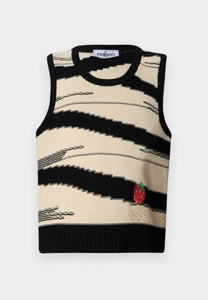 Knitted sleeveless sweater in beige with black zigzag stripes. Features a small embroidered red strawberry at the bottom. Ribbed neckline and hem.
