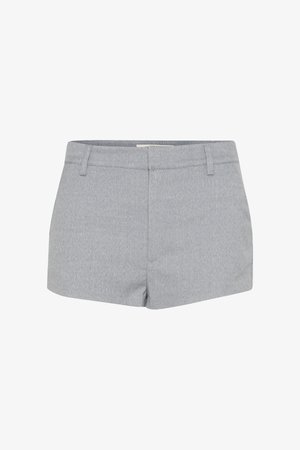 Pantaloni grigi realizzati in un tessuto testurizzato. Presentano una parte anteriore liscia con una vita, tasche laterali e un taglio sartoriale.