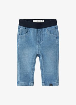 Modre denim legice s raztegljivim črnim pasom, ki vključujejo dve sprednji žepki in subtilne šive. Oznaka za velikost je vidna.