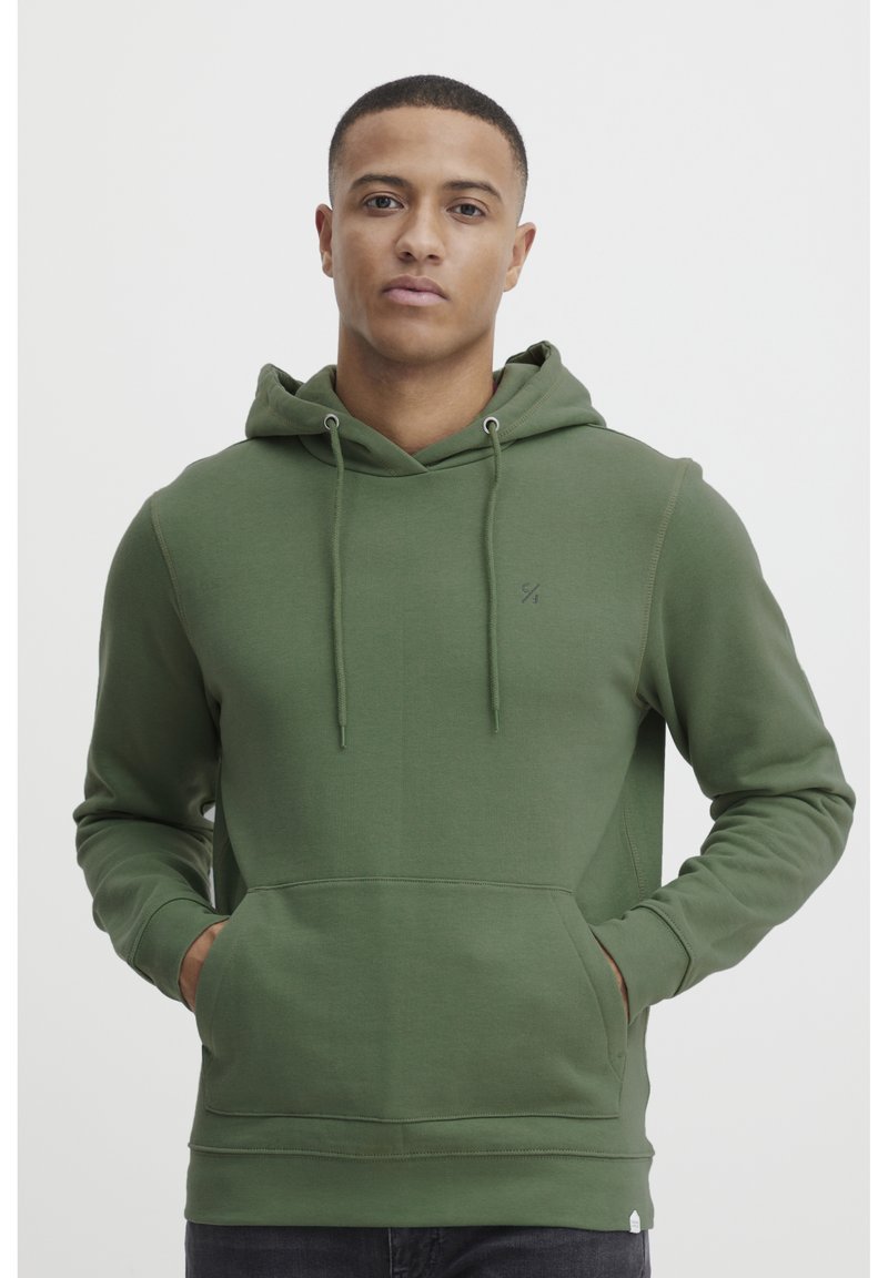 Olive green hoodie made of soft fabric, featuring a front pocket, drawstring hood, and subtle logo on the chest. Smooth texture and fitted design.