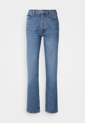 Blå denimjeans med høy midje, rett ben-design og subtil falming. Har klassisk fem-lomme stil og glidelås lukking.