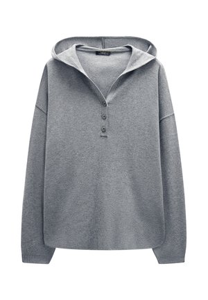 Szary, zakapturzony pulower z guzikowym zapięciem i długimi rękawami. Charakteryzuje się miękką teksturą oraz luźnym, oversize'owym krojem.
