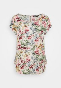 Blouse à manches courtes avec col rond et imprimé floral rose, vert, moutarde et gris sur fond blanc, avec une fermeture éclair au dos.