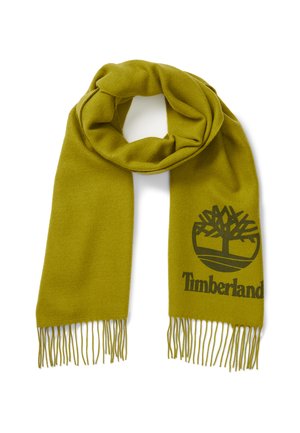 Grøn uldsløjfe med frynser i kanten, med et mørkegrønt Timberland-trælogo og mærkenavn trykt på den ene side.