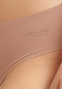 Sloggi HIPSTRING WEICH LEICHT UNSICHTBAR SAUMLO - Thong - beige