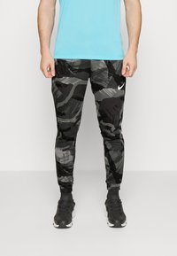 Nike Performance Jogginghose - black