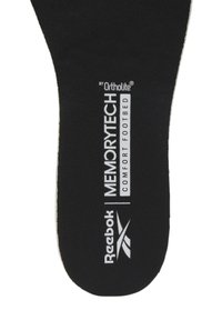 Czarna wkładka z technologią komfortu MemoryTech, z białymi logo Reebok i Ortholite. Gładka tekstura o zaokrąglonym kształcie.