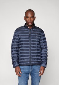 Tommy Hilfiger - PACKABLE CIRCULAR JACKET - Allvädersjacka - desert sky Miniatyrbild 1