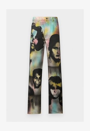 Straight-leg pants with a multicolor pastel background featuring large, black-and-white stencil-style faces of diverse people throughout.