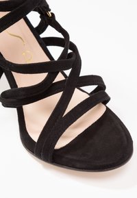 Unisa Sandales à talons hauts - black