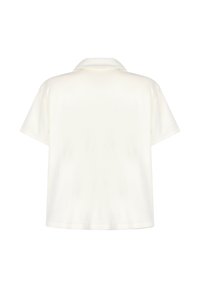Short-sleeved, collared shirt in a light beige color. Soft fabric with a smooth texture and a relaxed fit. Simple design, no patterns or accents.