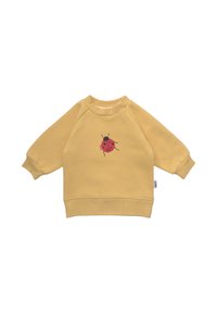 Gelbes Sweatshirt mit Raglanärmeln, aus weichem Stoff gefertigt. Auf der Vorderseite befindet sich ein gedrucktes Design einer schwarz-roten Marienkäfer.
