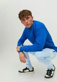 Jack & Jones JPSTWILL AIR PANTS - Træningsbukser - mountain spring