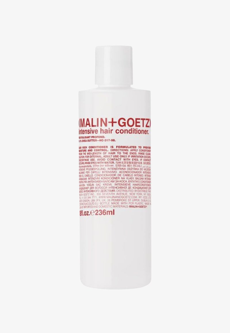Bouteille en plastique blanc d'après-shampooing intensif, avec une étiquette rouge comportant du texte. Forme arrondie, bouchon à vis, capacité de 236 ml.