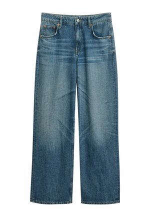 Light blue denim jeans with a loose, wide-leg fit. Features five pockets, a button closure, and subtle fading across the fabric.