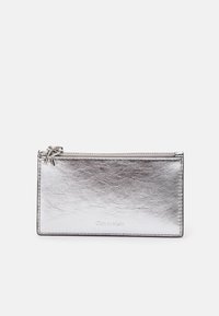 Sélectionné, silver-coloured