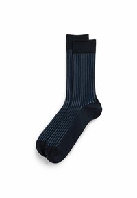 Marineblaue Socken mit vertikalen hellblauen Streifen, aus einem glatten Material, mit gerippten Bündchen und einem runden Zehenbereich.