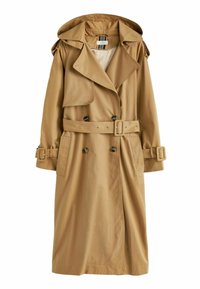 Trench-coat beige avec capuche, modèle à double boutonnage, taille ceinturée et brides de poignet ajustables. Tissu lisse avec un léger éclat.