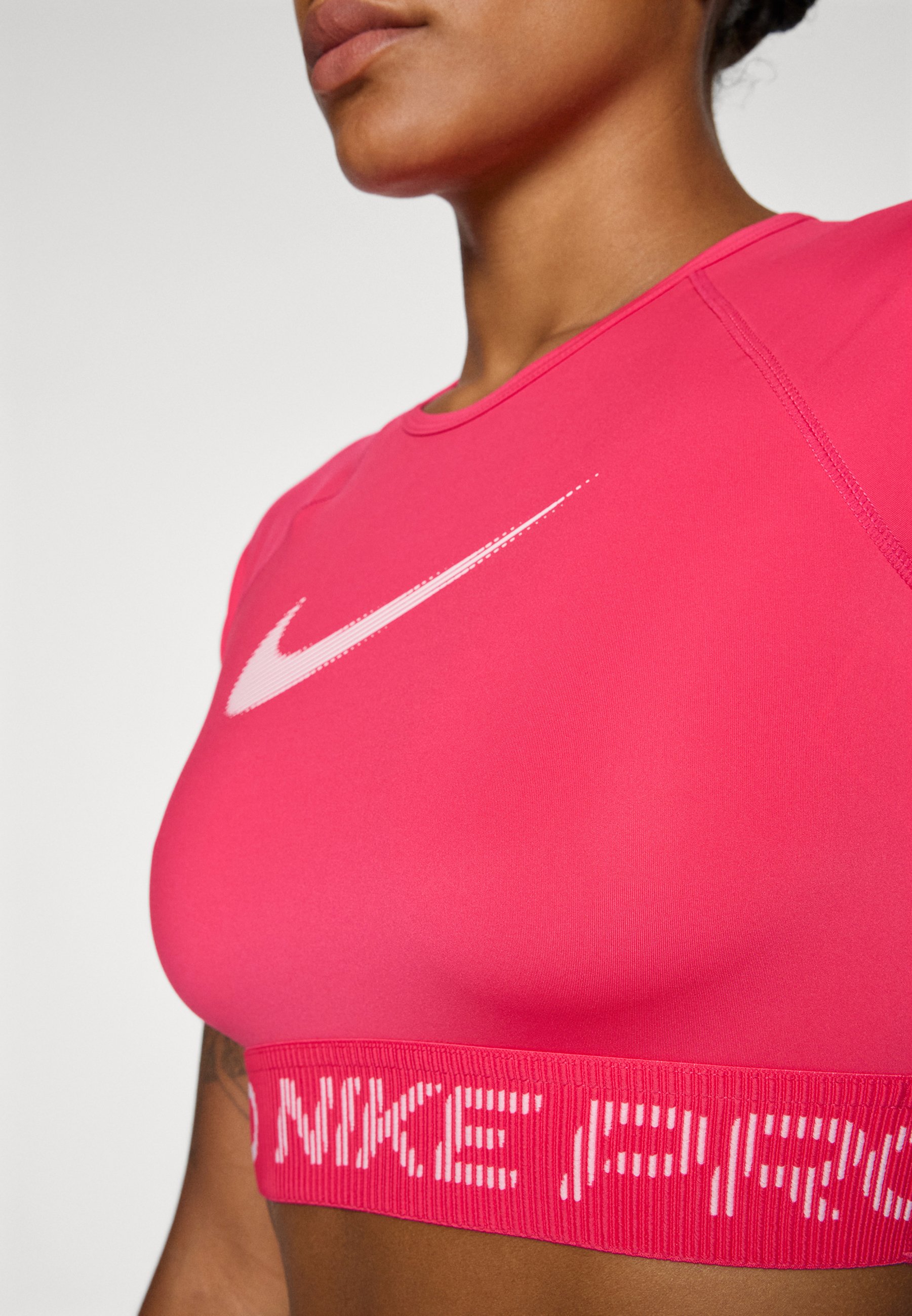 pink nike compression shirt