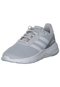 Light grey athletic shoe with mesh upper, synthetic overlays, lace-up closure, three white stripes on sides, and textured outsole.
