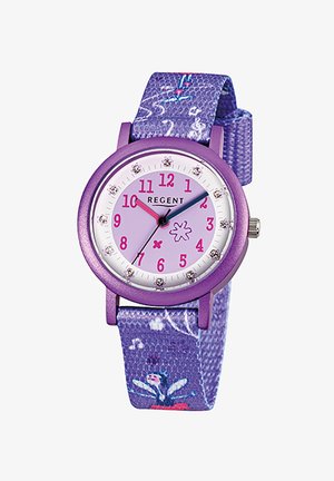 Lila analoge Kinderuhr mit pinkfarbenen Zahlen, Blumendesign auf dem Zifferblatt und gemustertem Stoffarmband mit Musiknoten und Instrumenten.