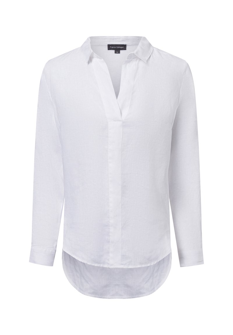 Witte lange mouwen shirt van textuurstof, met een V-hals en een gebogen zoom. Etiket zichtbaar aan de achterkant.