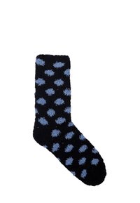 Calza nera pelosa con pois azzurri, tessuto testurizzato con una sensazione morbida e pelosa, e un design classico all'altezza della caviglia.