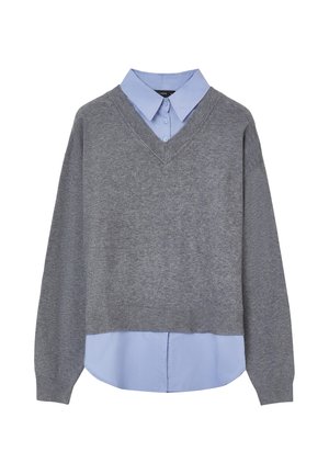Gray cropped sweater with V-neck and long sleeves layered over a light blue button-up shirt. Features ribbed cuffs and hem.