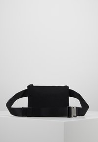 Zign Bältesväska - black