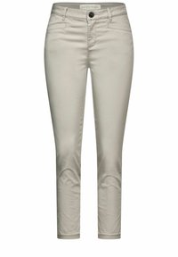 Beige bomullsmixade byxor med slim fit, fem fickor, dragkedja och knappstängning fram, samt sydda detaljer längs sömmarna.