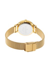 Gold mesh strap watch with a smooth round case, polished finish, and a secured clasp, featuring a minimalist design on the watch face.